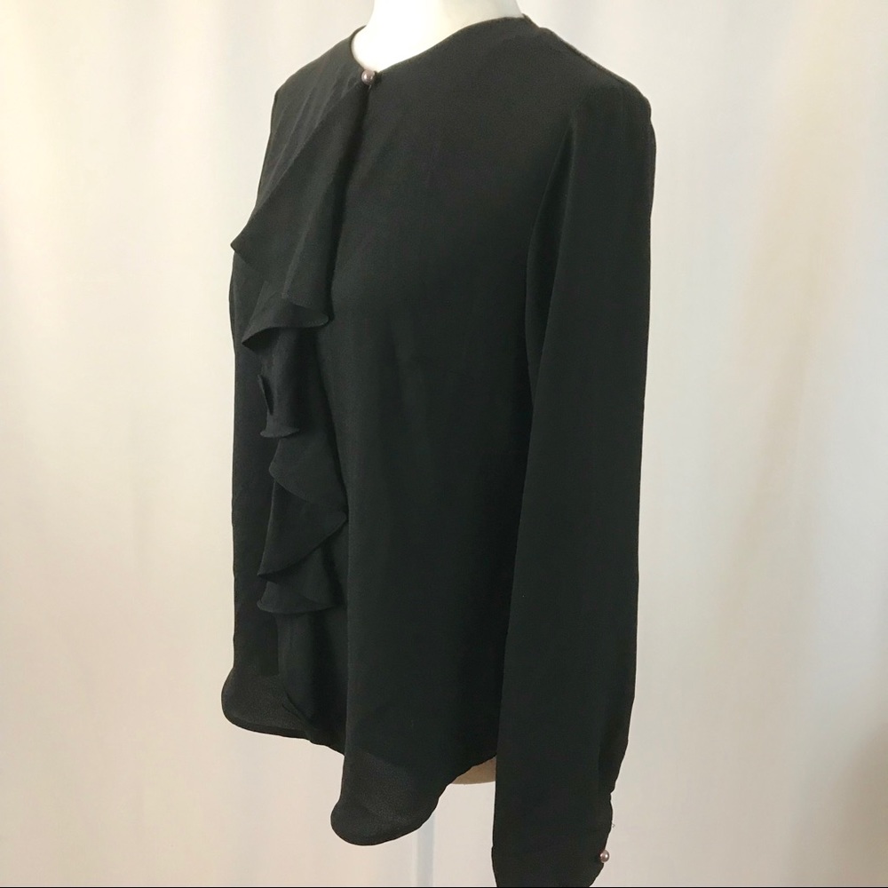 Long sleeves blouse w/ruffle in the front. 100,101